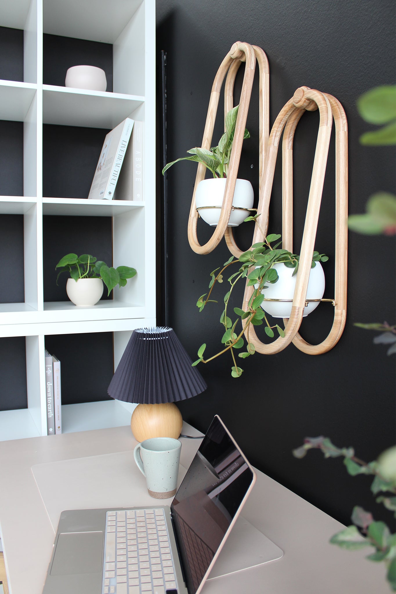 moody home office with black accent wall, styled with frame wall planters by braid & wood